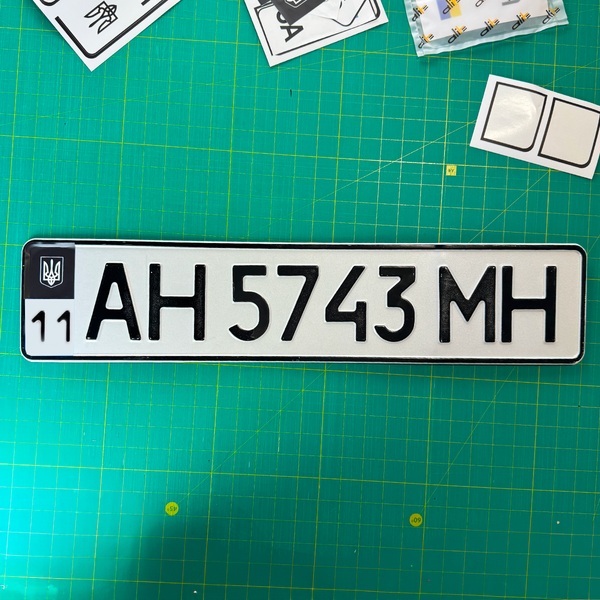 Наліпка номерного знаку Alite Stickers - Іменна "Герб" Чорна 31006 фото